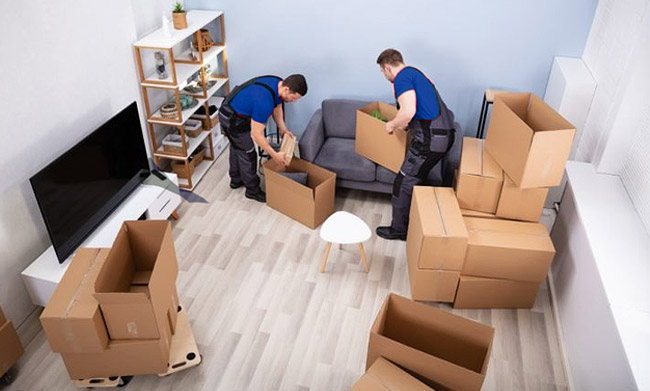 Professional house shifting services in Abu Dhabi with expert movers handling packing, loading, and furniture moving