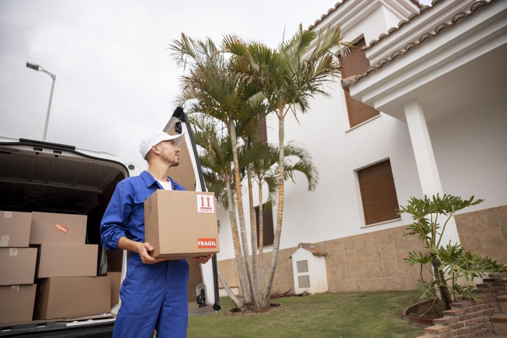 Professional villa movers in Dubai dismantling and reassembling furniture with care and precision during relocation.